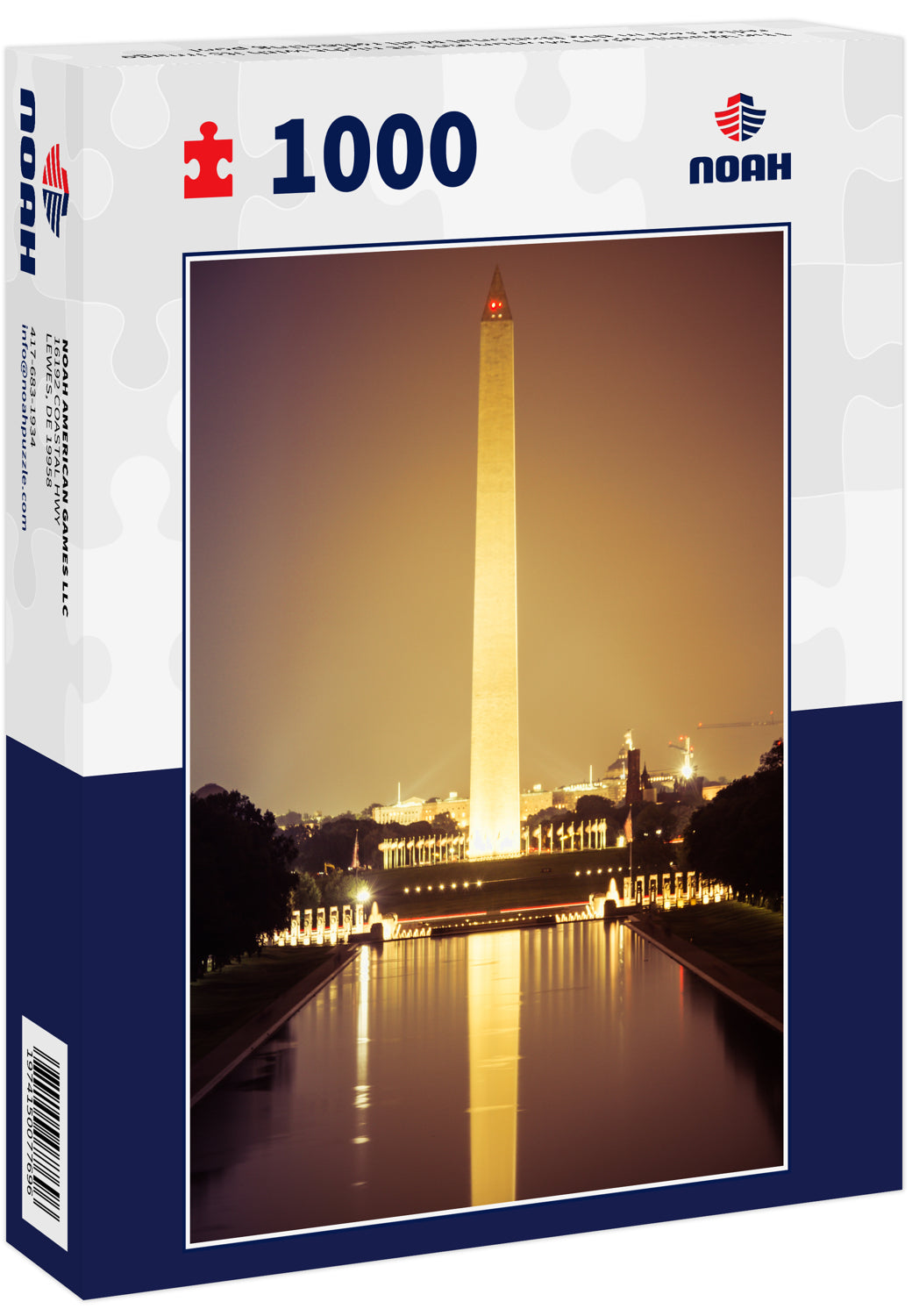 The Washington Monument at night with its image reflected in the National Mall reflecting pool
