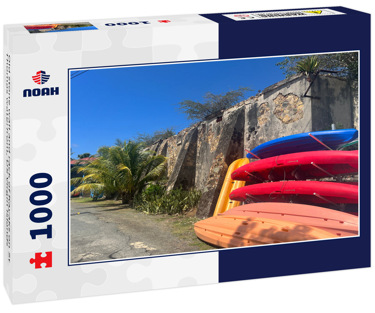 Old stone wall and rack of Kayaks on St Thomas waterfront, US Virgin Islands