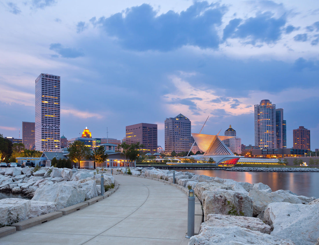 Noah Jigsaw Puzzle City of Milwaukee skyline. Image of Milwaukee skyline at twilight with city reflection in lake Michigan and harbor pier 1000 pieces