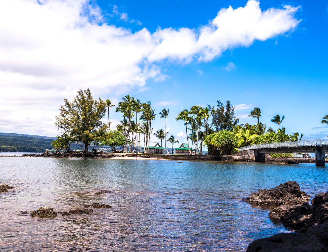 Noah Jigsaw Puzzle Coconut Island Hawaii depicts a calm day with gentle waves washing ashore highlighting the tropical climate and look of paradise 1000 pieces