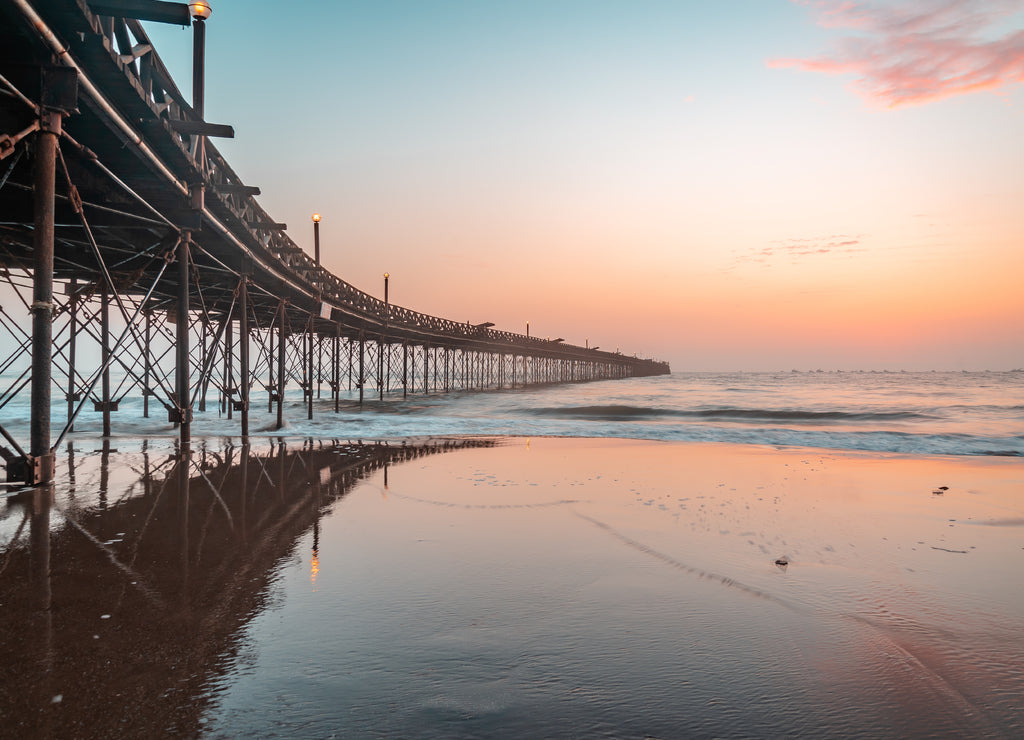 Pier over the sea against the sky at sunset, Peru