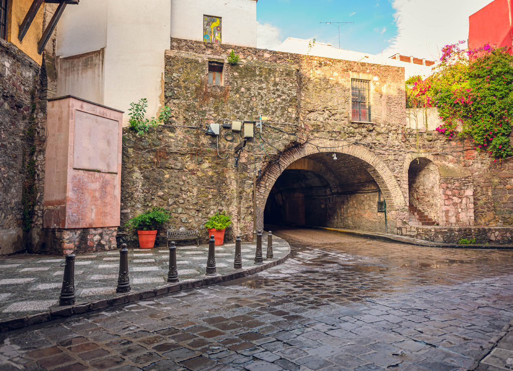 Streets of historic downtown Guanajuato, city tunnels and colorful houses in colonial style of a Mexican city