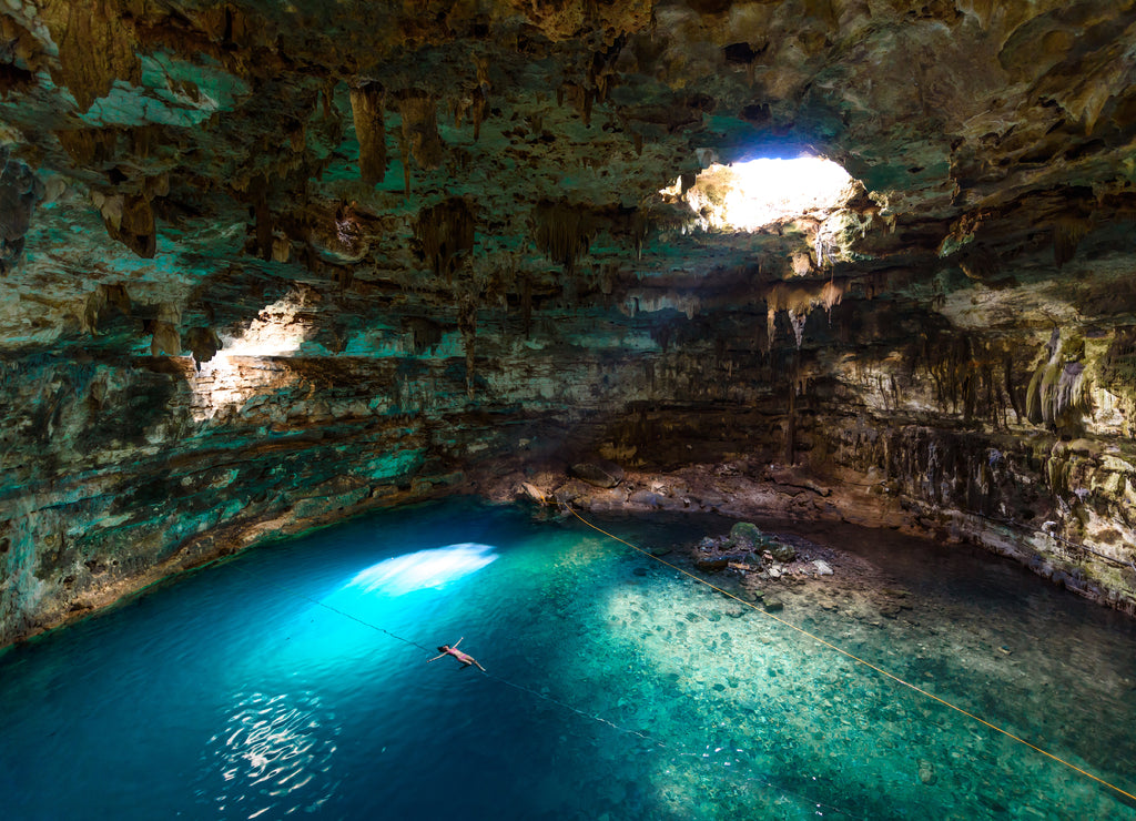 Cenote Samula Dzitnup near Valladolid, Yucatan, Mexico - swimming in crystal blue water