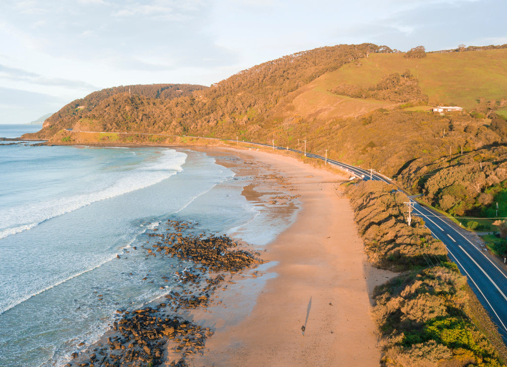 Waves and People and Beach Along Great Ocean Road, Victoria, Australia at Sunrise