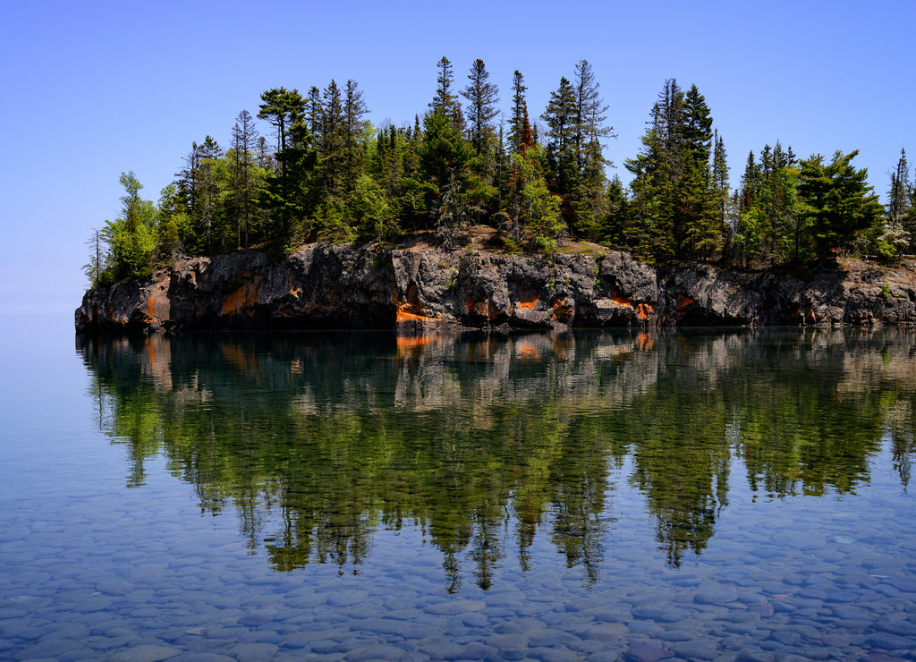 Reflection in Lake Superior water Ellingson Island MN
