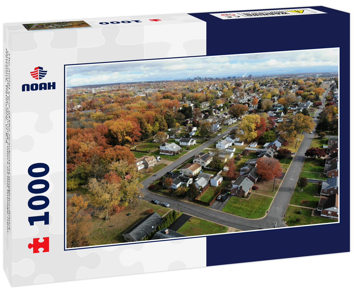 The aerial view of the residential neighborhood surrounded by stunning colors of fall foliage near Newport, Delaware, U.S.A