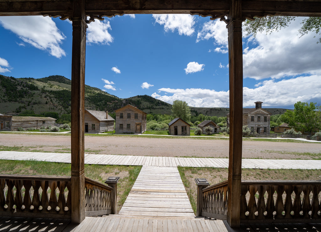 Scenic view from the hotel porch of the other abandoned, decaying buildings of Bannack Ghost Town in Montana