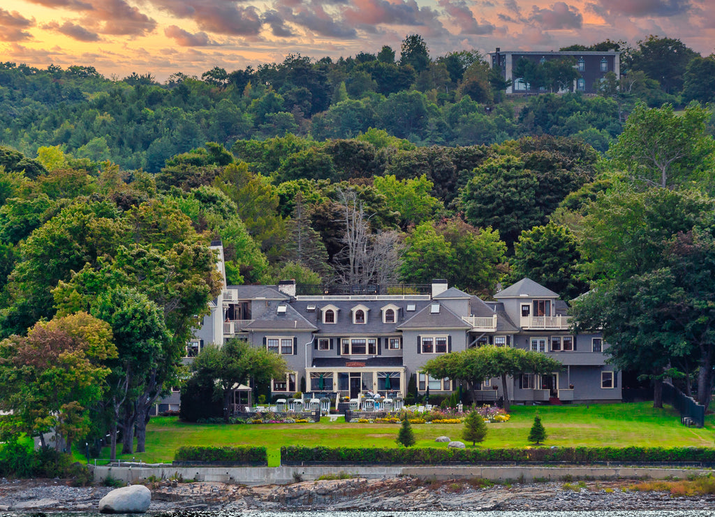 Old gray wood inn on the coast of Maine near Bar Harbor