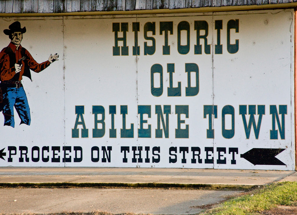 United States, Kansas, Abilene. A painted sign directs visitors to historic Old Abilene Town