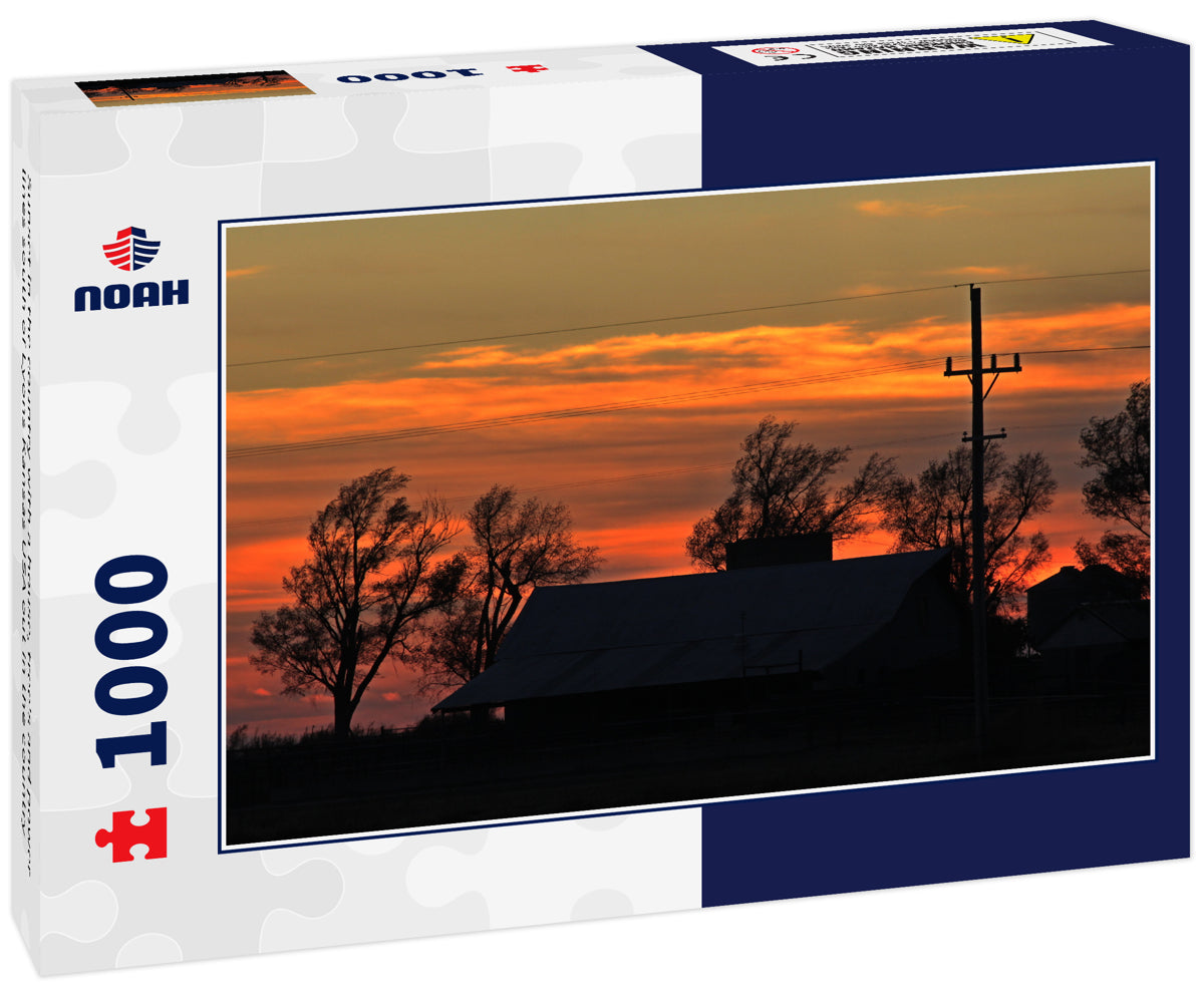 Sunset in the country with a house, tree's and power lines south of Lyons Kansas USA out in the country