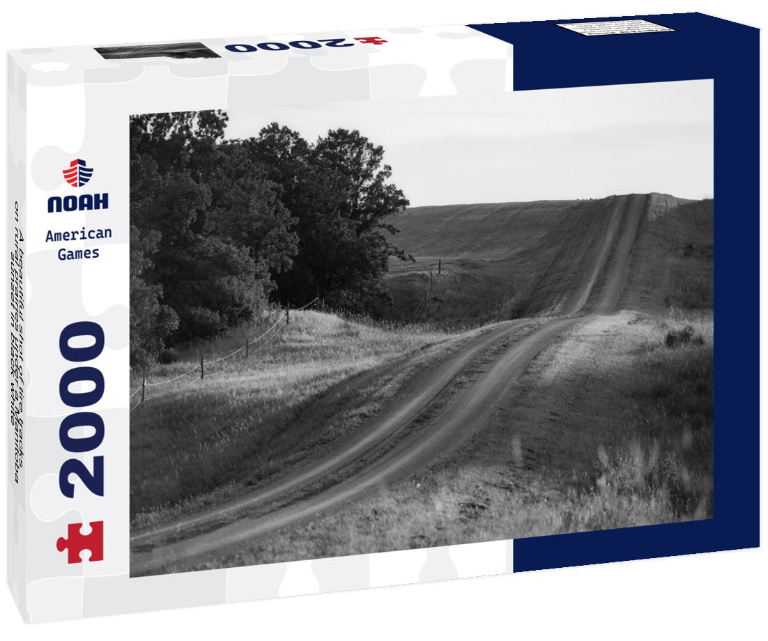 A beautiful shot of tire tracks on rural prairies under a Manitoba sunset 2000pc PuzzleBlack and White