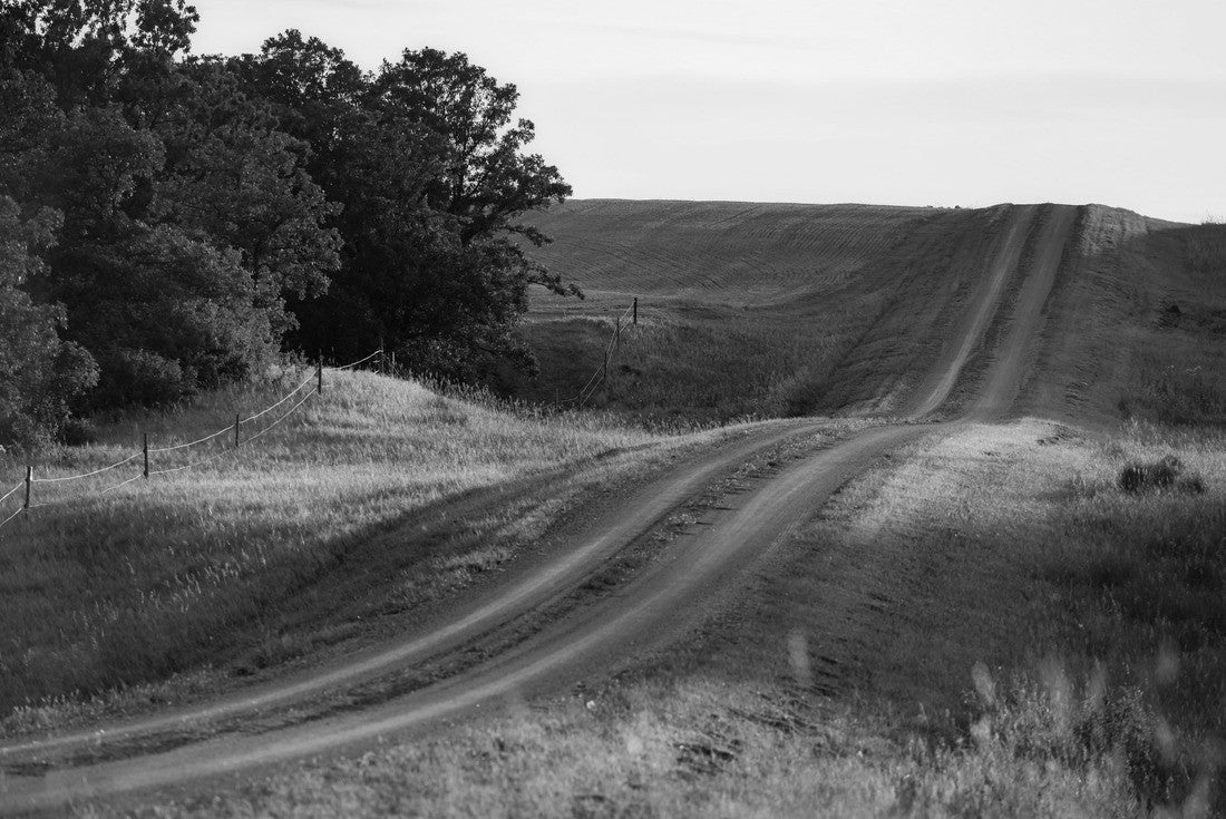 A beautiful shot of tire tracks on rural prairies under a Manitoba sunset 2000pc PuzzleBlack and White