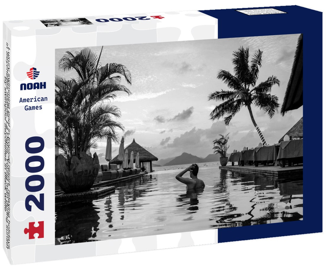 Noah Jigsaw Puzzle Luxury swimming pool in tropical resort, relaxing holidays in Seychelles islands. La Digue, Young man during sunset by swimpool Seychelles in black white 2000 pieces