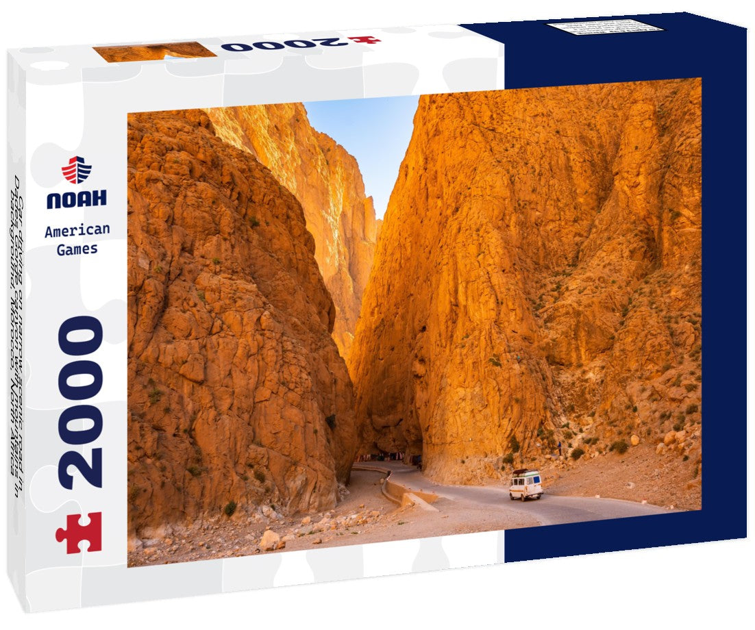 Noah Jigsaw Puzzle Car driving on narrow scenic road in Dades Gorge canyon with mountains in background, Morocco, North Africa 2000 pieces