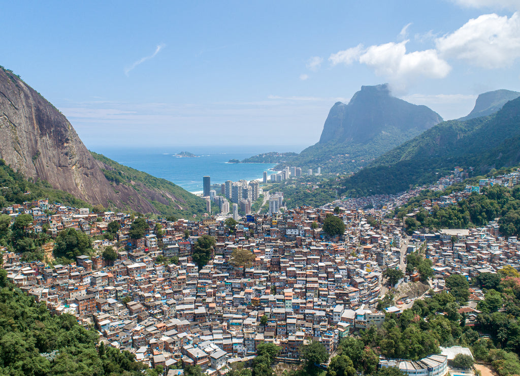 Favela da Rocinha, Biggest Slum in Brazil on the Mountain in Rio de Janeiro, and Skyline of the City behind