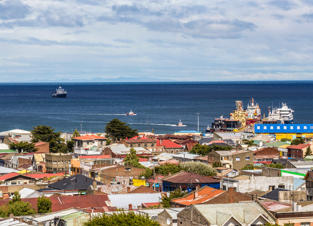 Aerial view of the Punta Arenas town with Strait of Magellan on background (Mirador Cerro De La Cruz). Skyline of Punta Arenas, Patagonia Chilena, Chile