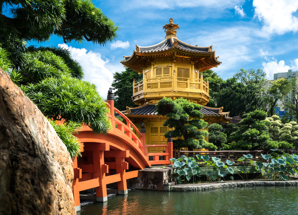 Front view the Golden pavilion temple with red bridge in Nan Lian garden, Hong Kong. Asia