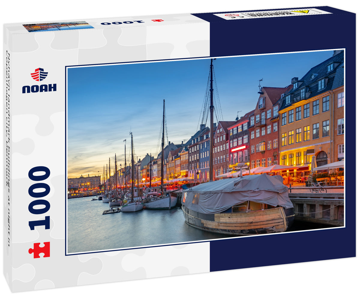 Nyhavn landmark buildings at night in Copenhagen city, Denmark
