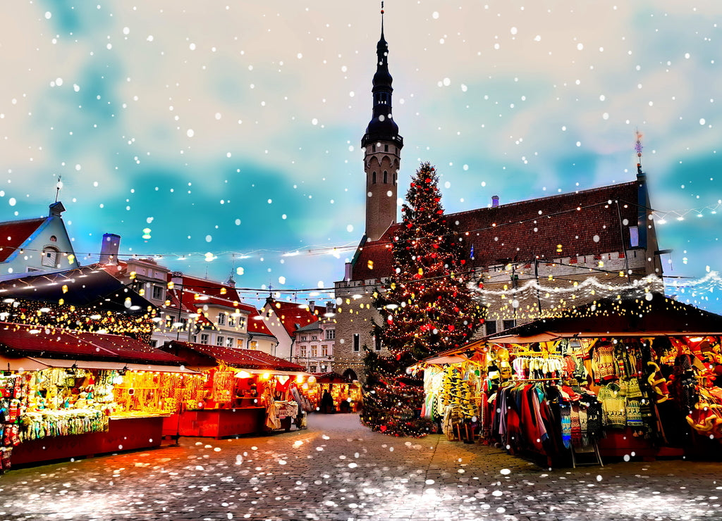 Christmas Tallinn Old Town Hall Square Winter night marketplace and tree light decoration , holiday celebration in Europe blurred night light ,snowflakes fall ,travel Estonia