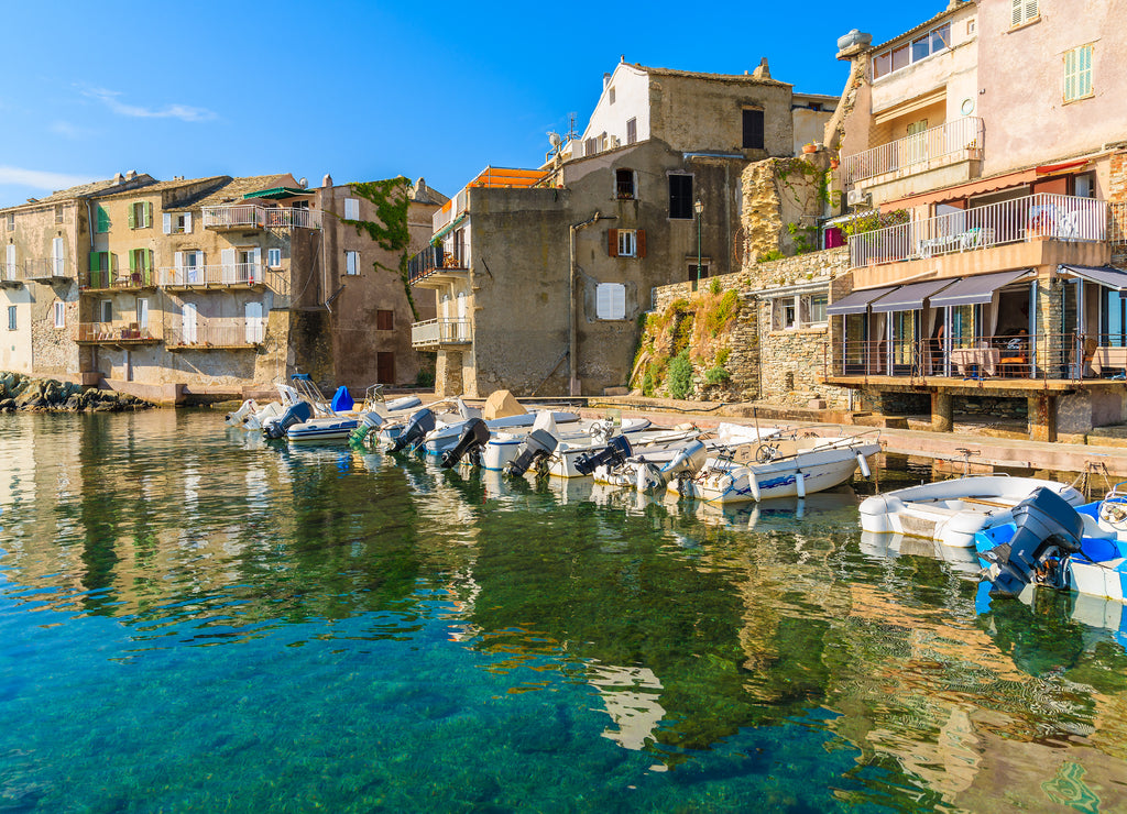 Colorful boats in Erbalunga port on Cap Corse, Corsica island, France