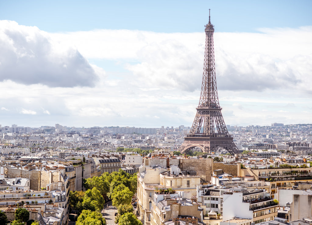 Aerial cityscape view on the Eiffel tower during the sunny day in Paris