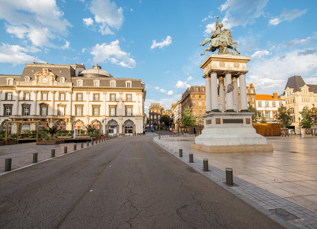 View on the Jaude square with statue during the sunset in Clermont-Ferrand city in central France