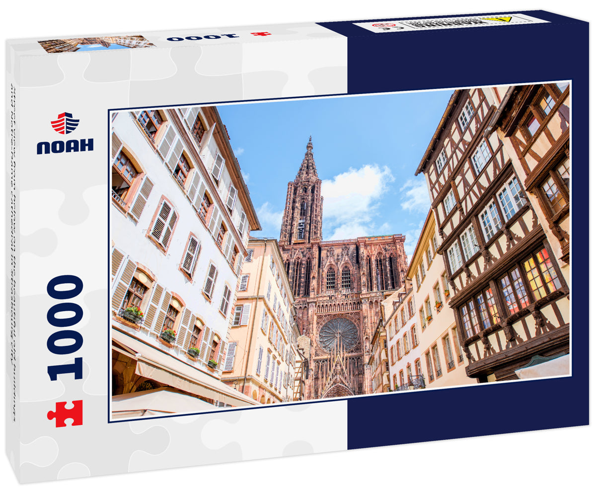 Street view from below on the beautiful old buildings and Notre-Dame cathedral in Strasbourg city