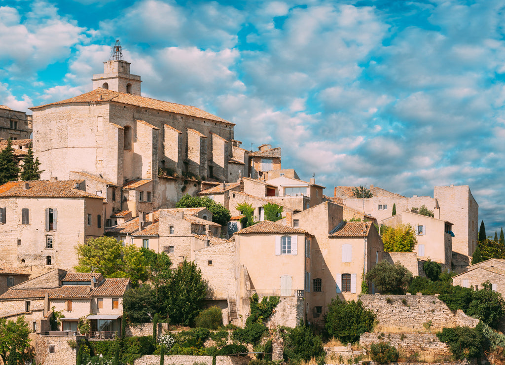 Gordes, Provence, France. Beautiful Scenic View Of Medieval Hilltop Village Of Gordes. Sunny Summer Sky