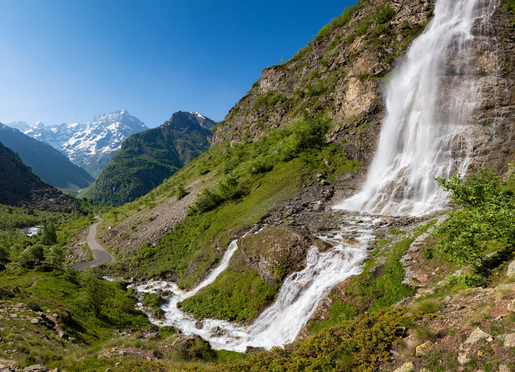 The Ecrins National Park most famous waterfall: Le Voile de La Mariée. Valgaudemar Valley in Summer, Hautes-Alpes, French Alps