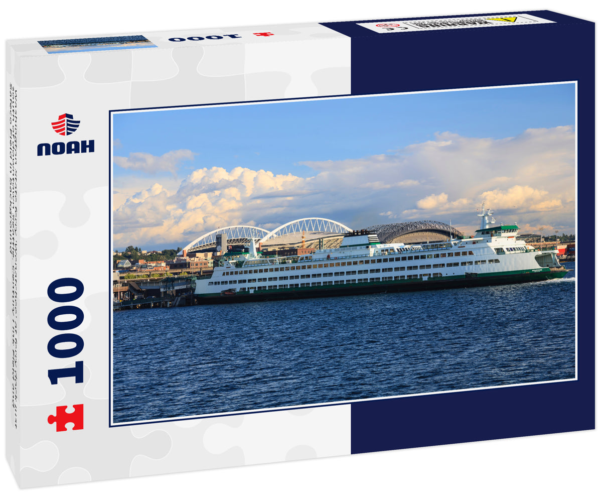Washington State ferry 'Wenatchee' at ferry dock just south of downtown Seattle. Century Link Field and Safeco Field in background