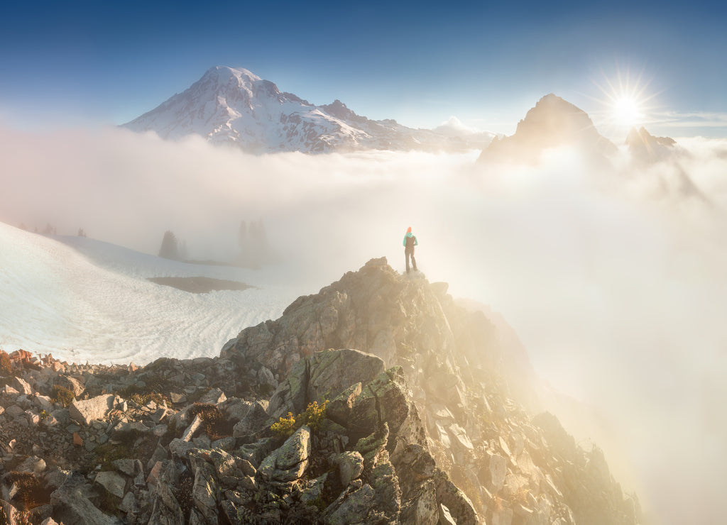 Mount Rainier National Park in the Cascade Range, Washington State, USA. A beautiful active volcano at sunset in North America. Summer time
