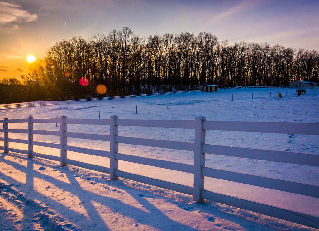 Sunset over a farm field in rural Carroll County, Maryland