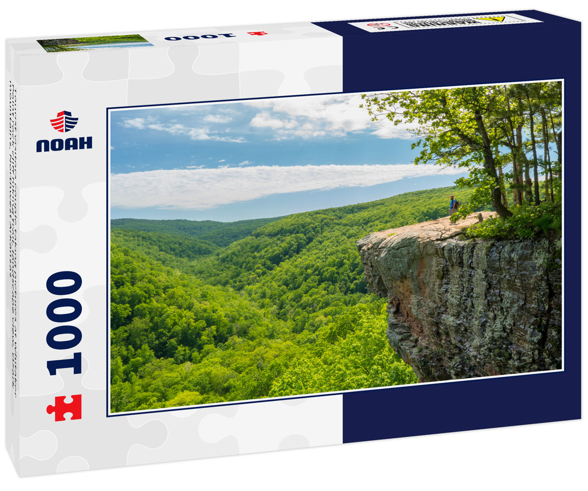 Tourist visitors couple taking pictures at Whitaker Point rock cliff hiking trail, landscape view, Ozark mountains, Northwest Arkansas
