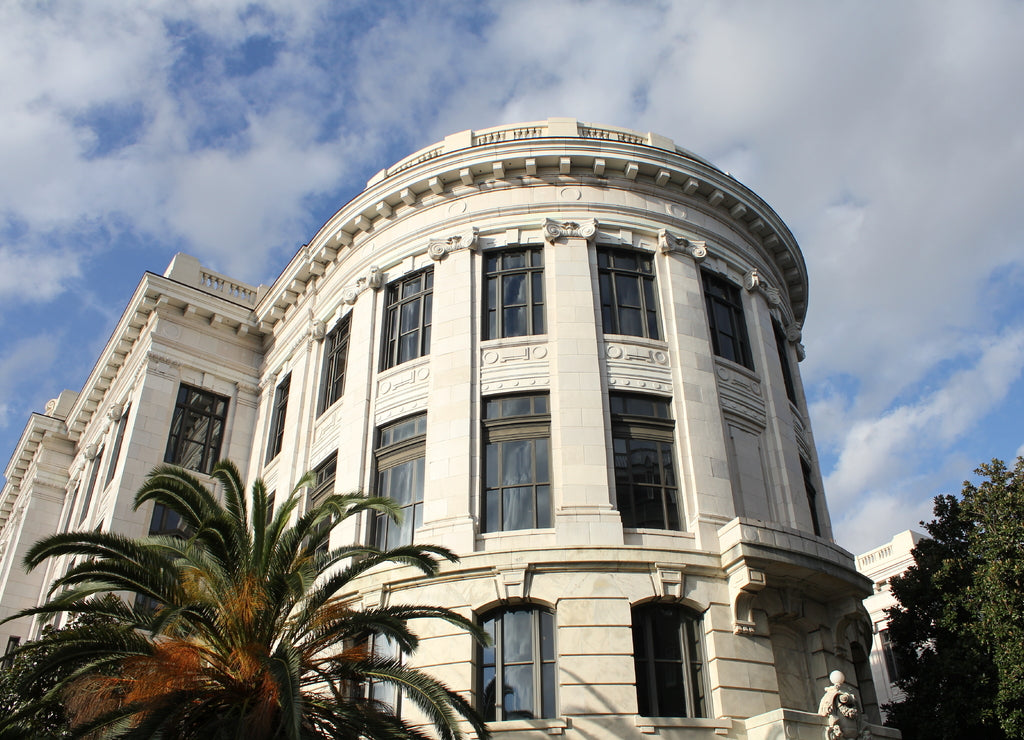 Outside the Supreme Court of Louisiana on Royal Street, in the iconic French Quarter. Features statue of Judge Edward Douglas White at the front of entrance