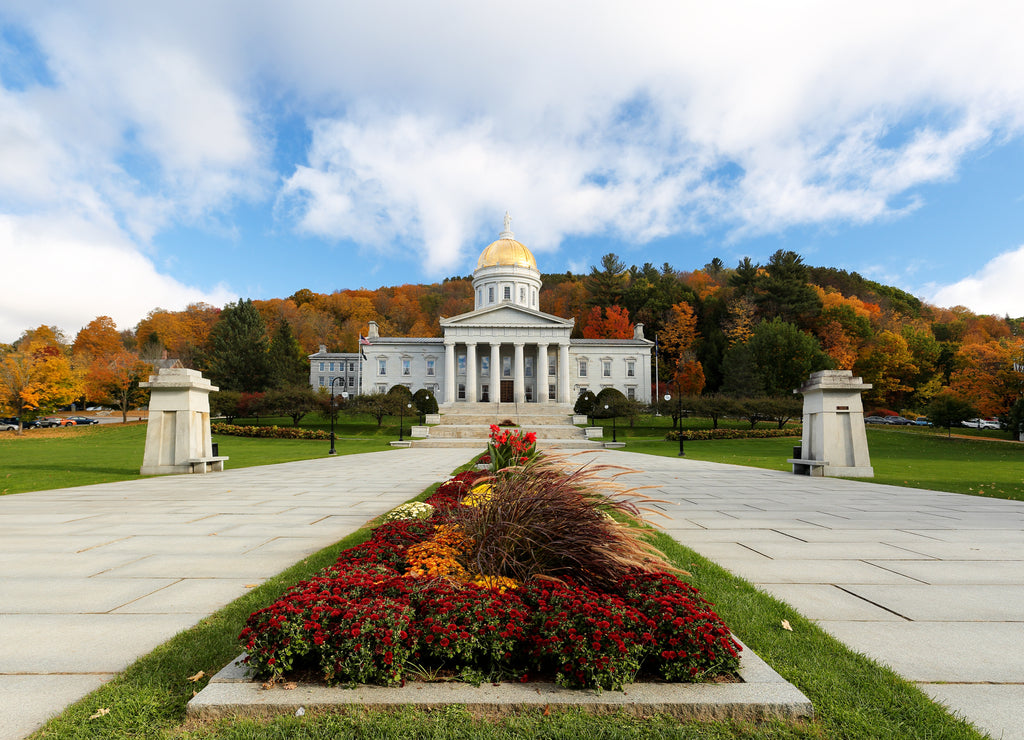 The Vermont State House with Colorful Foliage in Background. Located in Montpelier, the house is the state capitol of Vermont, in the United States