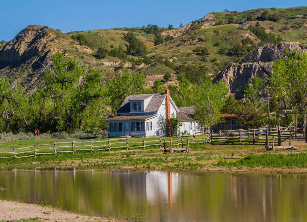 Ranch house and pond in Teddy Rosevelt National Park, North Dakota