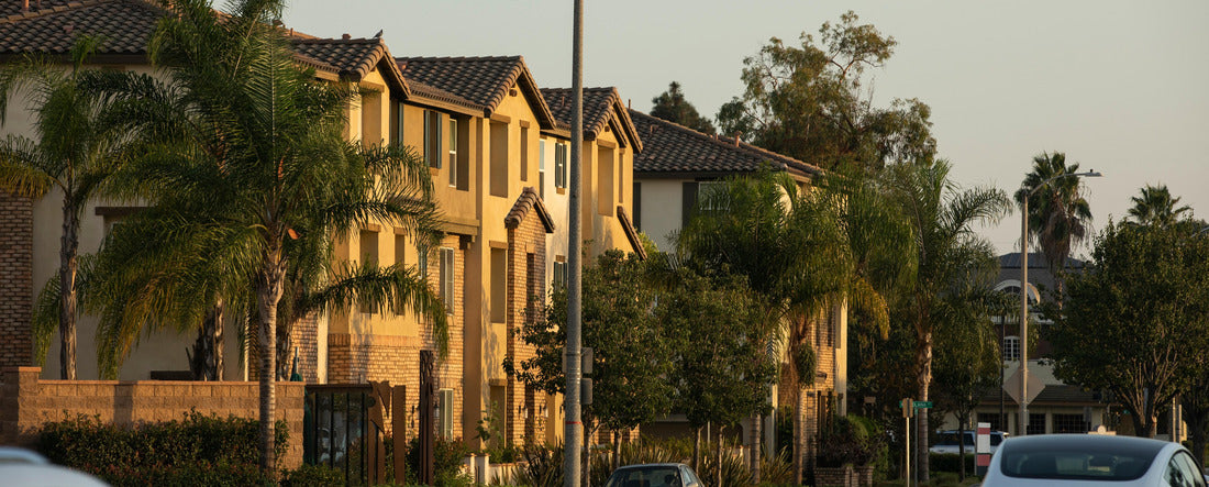 Afternoon sunset light shines on downtown housing buildings in Artesia, California, USA 2000pc Panoramic Puzzle