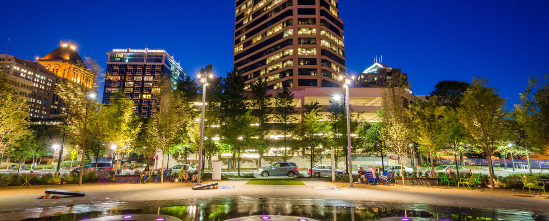 Fountains and buildings at Lebauer Park at night, in downtown Greensboro, North Carolina 2000pc Panoramic Puzzle