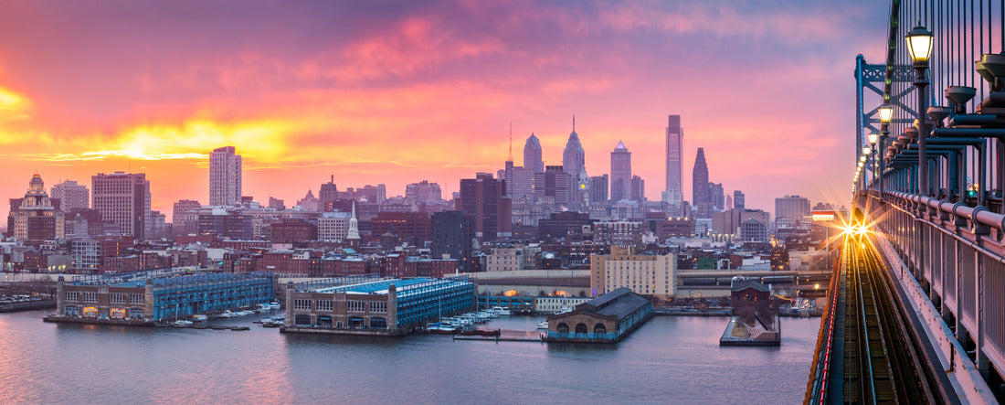 Philadelphia under a violet sunset. An arriving train crosses the Ben Franklin Bridge 2000pc Panoramic Puzzle
