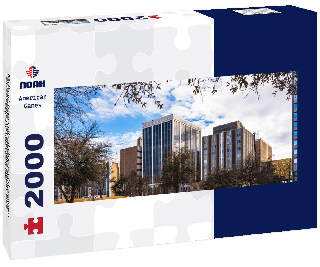 Midland Texas city skyline and downtown skyscrapers with dramatic cloudy blue sky and tree branches 2000pc Panoramic Puzzle