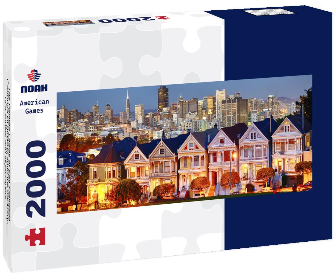 The Painted Ladies of San Francisco, California sit glowing amid the backdrop of a sunset and skyscrapers 2000pc Panoramic Puzzle