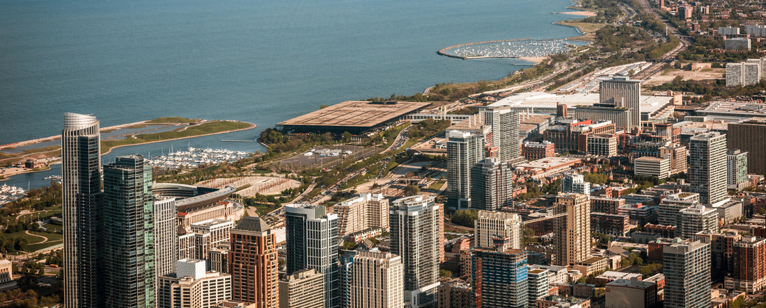 Aerial view looking out over the south shore of Chicago Illinois with the steel mills of Gary Indiana in the distance 2000pc Panoramic Puzzle