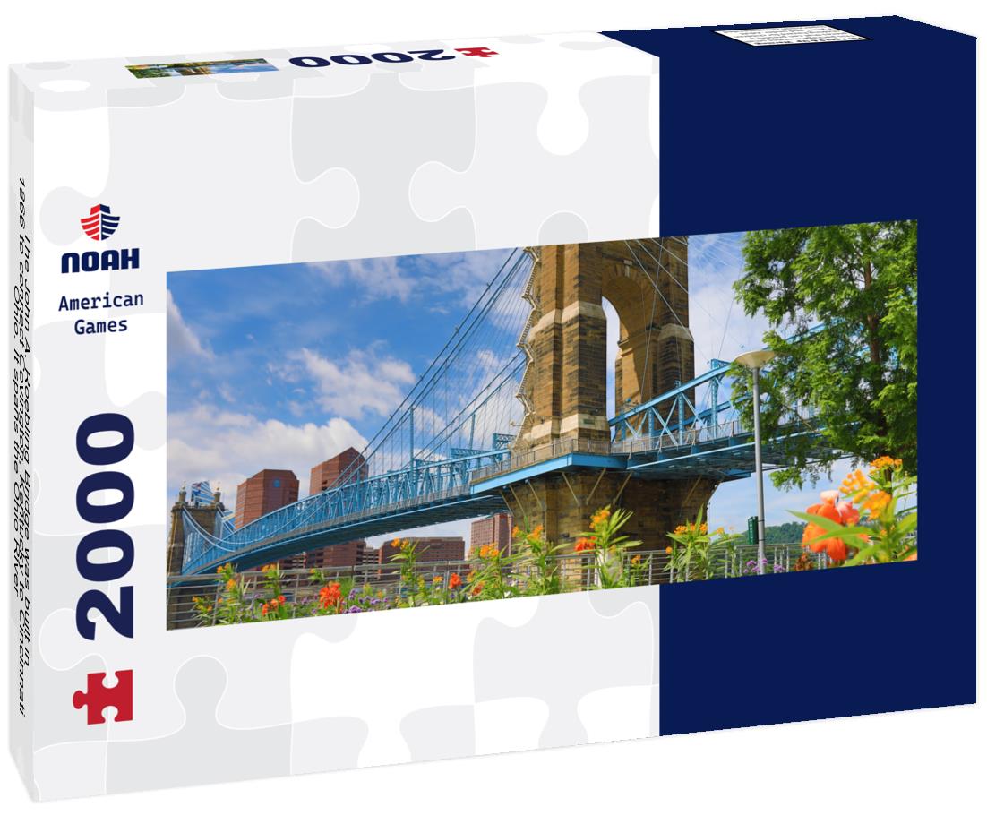 The John A. Roebling Bridge was built in 1866 to connect Covington, Kentucky to Cincinnati, Ohio. It spans the Ohio River 2000pc Panoramic Puzzle