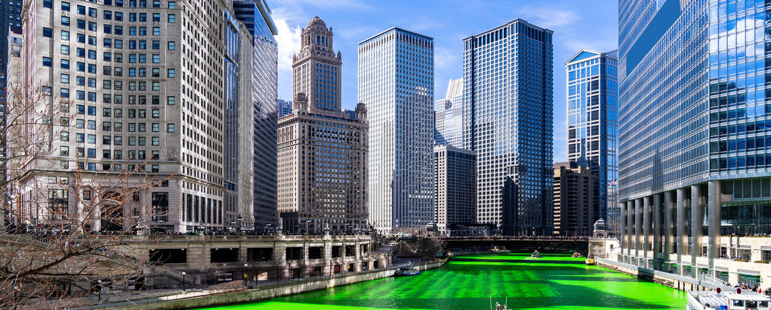 Chicago skylines buildings along the green coloring Chicago River at St. Patrick's Day Festival in Chicago Downtown IL USA 2000pc Panoramic Puzzle