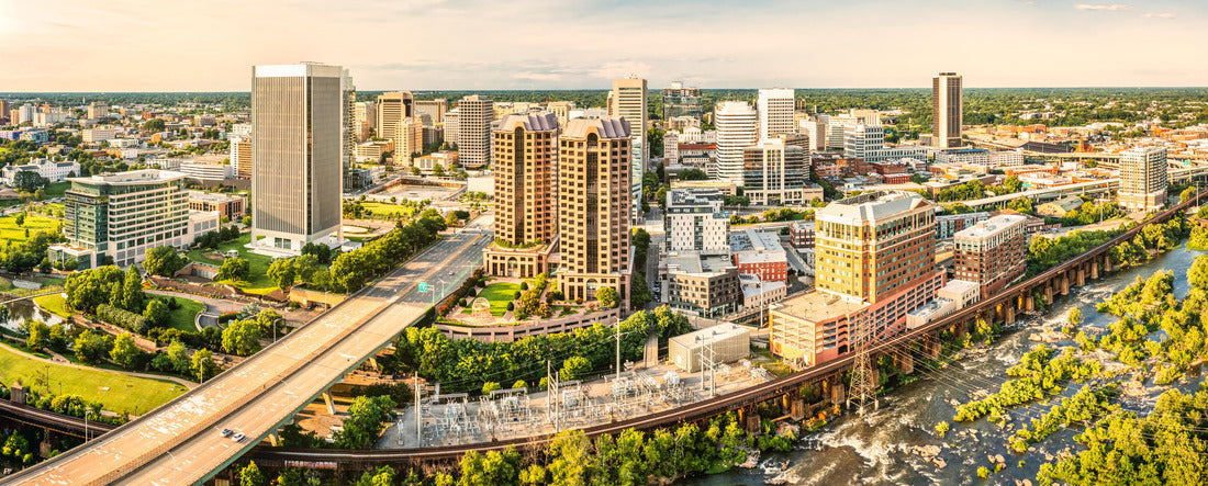 Richmond, Virginia, at sunset. Richmond is the capital city of the Commonwealth of Virginia. Manchester Bridge spans James River 2000pc Panoramic Puzzle