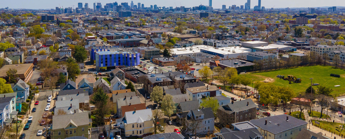 Somerville city center aerial view on Somerville Avenue with Boston skyline at the background in spring, city of Somerville, Massachusetts MA 2000pc Panoramic Puzzle