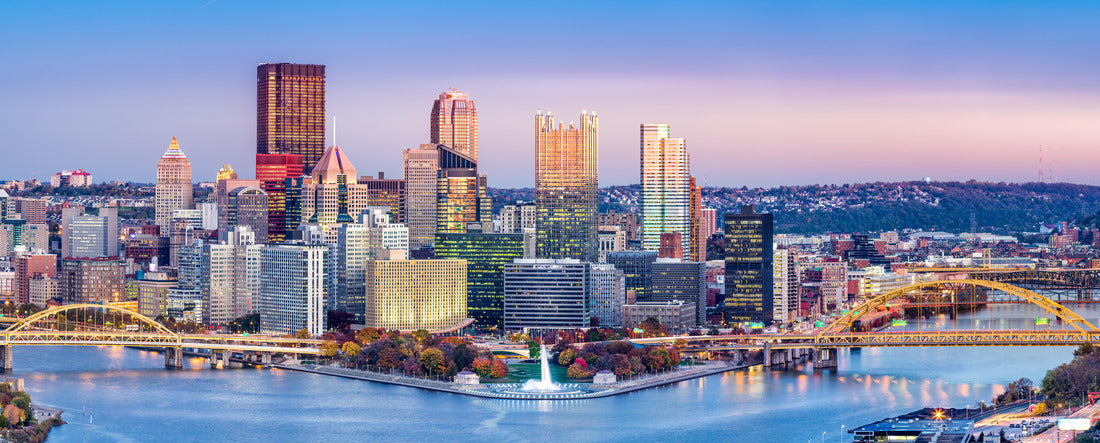 Pittsburgh, Pennsylvania skyline at dusk. Located at the confluence of the Allegheny, Monongahela and Ohio rivers, Pittsburgh is also known as "City of Bridges" 2000pc Panoramic Puzzle