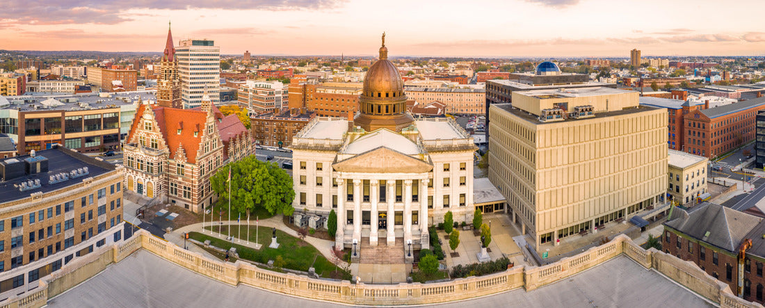 Aerial view of Paterson, NJ at sunset. Three public buildings dominate the skyline: Passaic County Court House Annnex, Historic Court and Passaic County Superior Court 2000pc Panoramic Puzzle