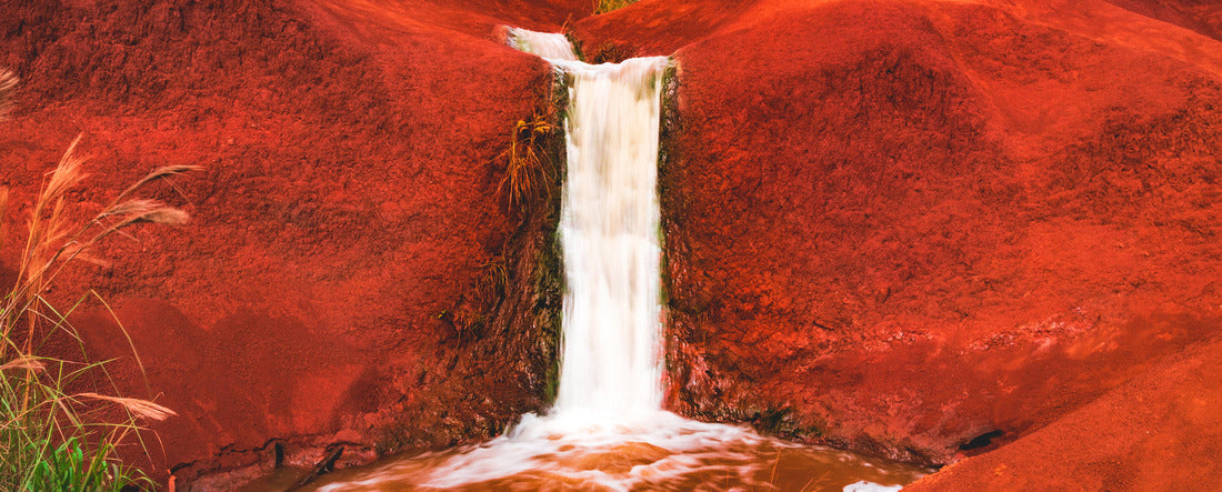 The famous Red Waterfalls, a cascading freshwater waterfall over iron-rich basalt in Waimea Canyon State Park, on the west side of the island of Kauai, Hawaii, USA 2000pc Panoramic Puzzle