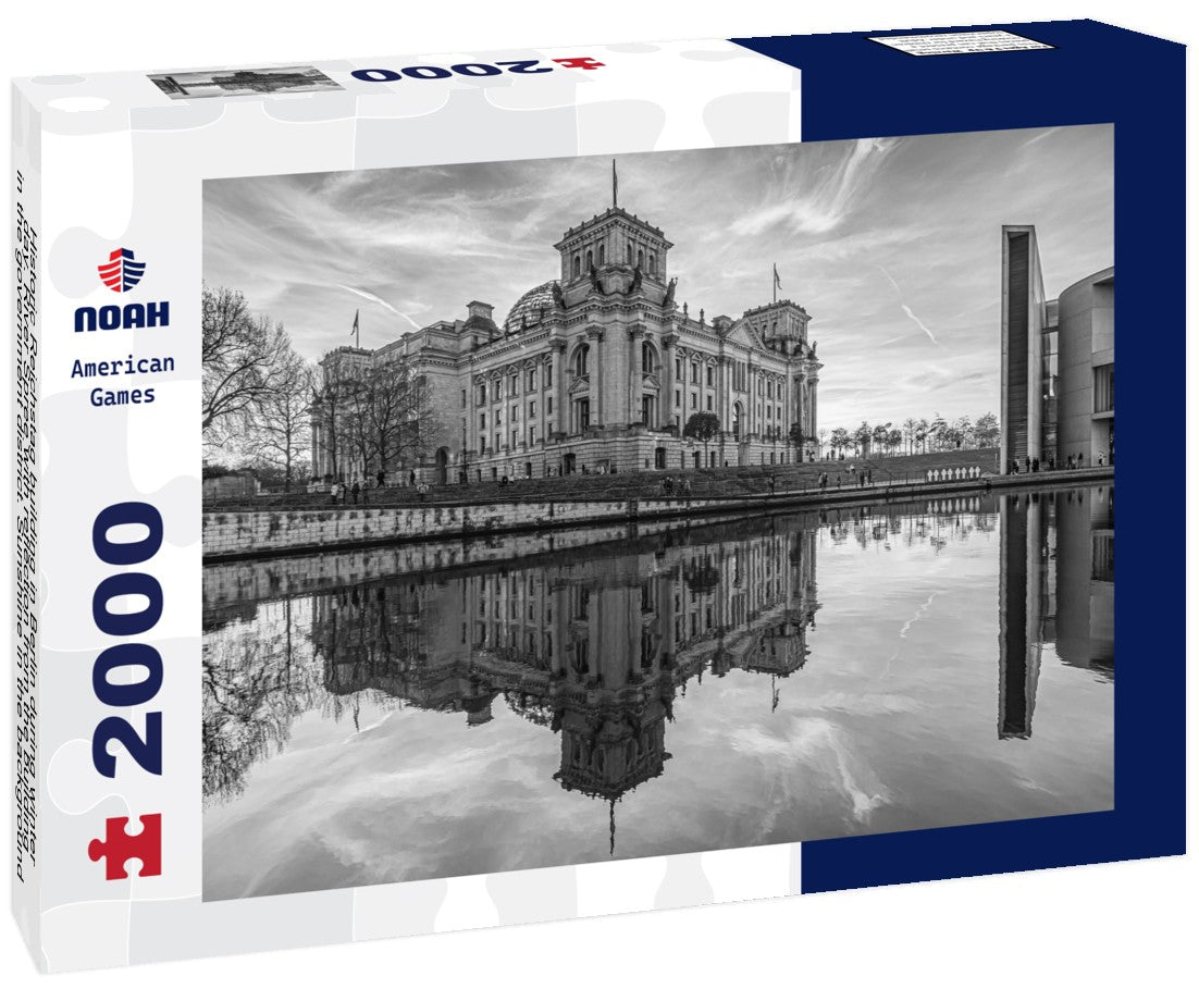 Noah Jigsaw Puzzle Historic Reichstag building in Berlin during winter day. River Spree with reflection from the building in the government district. Sunshine in the background with cloudy sky in black white 2000 pieces